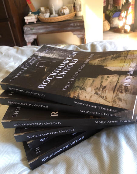 A stack of books Rockhampton Untold by Mary-Anne Forrest